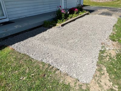 Stone prep for concrete walkway.