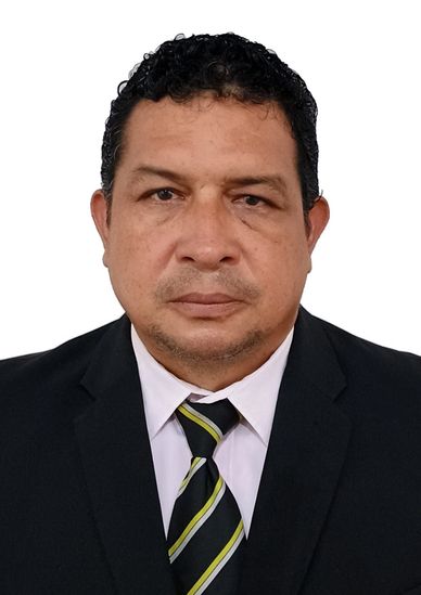 Professional man in suit and striped tie against white background.
