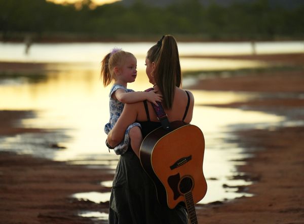 Local musician Amy van der Schuit and her daughter and the Clay Pans, Alice Springs