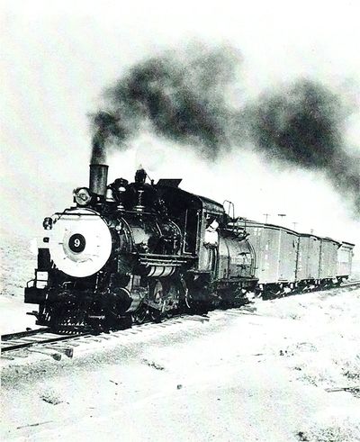 #9 hauling freight boxcars with 401 caboose