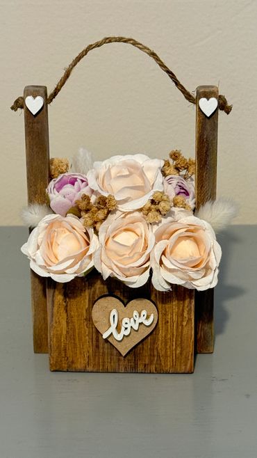 Wooden Love Wishing Well with flowers and love hearts.