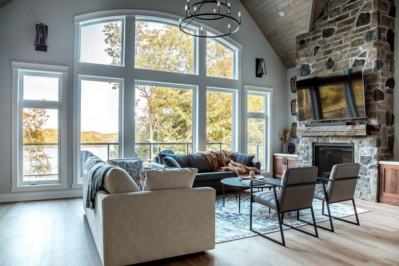 Enjoy a movie by the gas fireplace in the great room with expansive views overlooking Redstone Lake.