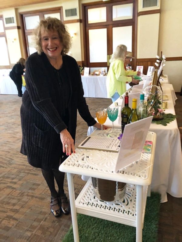 One of our members making a bid at the silent auction.