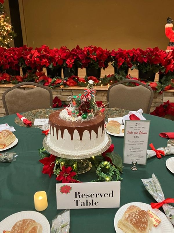 Holiday Luncheon 2024 reserved table decorations and centerpiece close-up.