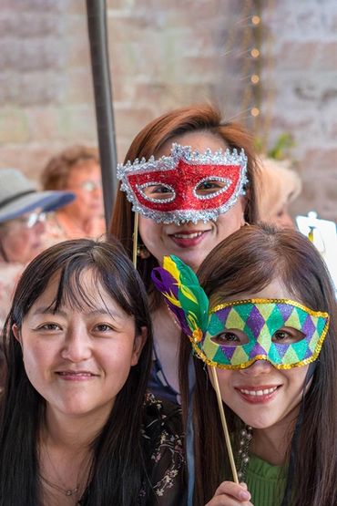 WVGC members with Mardis Gras masks.