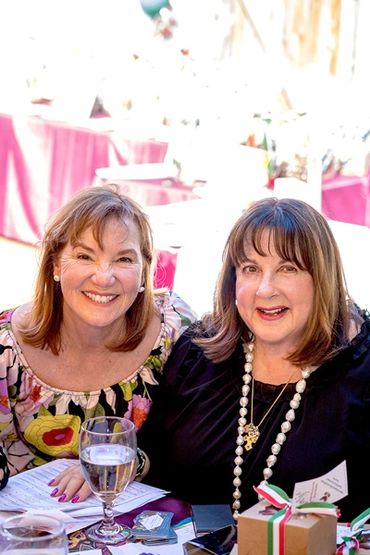 Two WVGC members seated at their table.