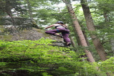 woman on an amazing rock climbing adventure in the hocking hills ohio