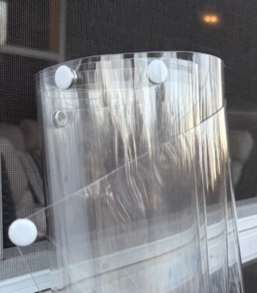 We use industrial strength 30 Mil UV coated and flame retardant rated clear PVC