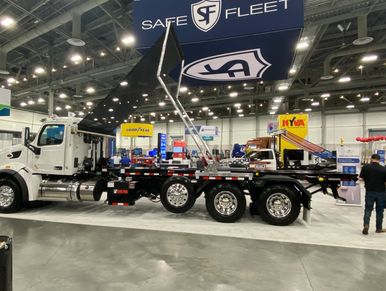 Smith Truck Body Peterbilt 567 Waste Expo Roll-Rite Safe Fleet Truck