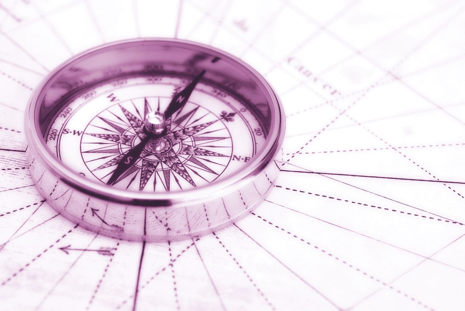 Compass pointing to True North, most common navigation tool for travelers, aimed at fixed point