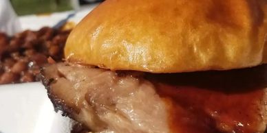 5oz of brisket served on a garlic-toasted brioche bun, with mayo, fried onions, pickles and homemade