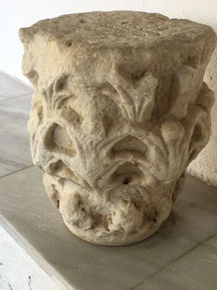 Column capital displayed at Ekatontapyliani Church, Paros, Greece. Photo by Liz O'Sullivan.