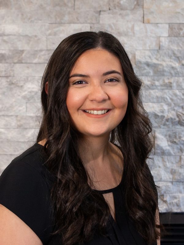 Headshot of receptionist Monica.