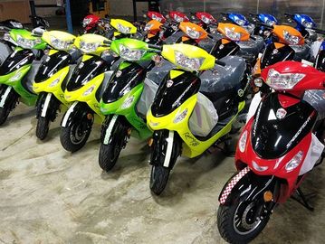 Array of Revolution X 50cc scooters in all colors.