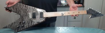 War v slimline, harpoon headstock, clients name in japanese on fingerboard and a custom color custom