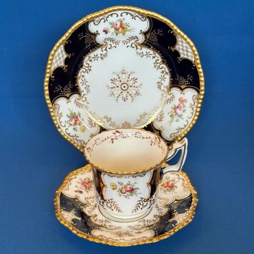 Coalport bat wing cup, saucer and side plate circa 1840