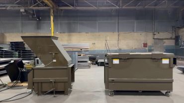 Stationary compactor with a 2 yard compactor container, Elite Containers, Waterbury CT