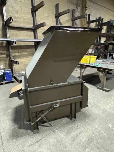 Stationary compactor with hopper door open, Elite Containers, Waterbury CT