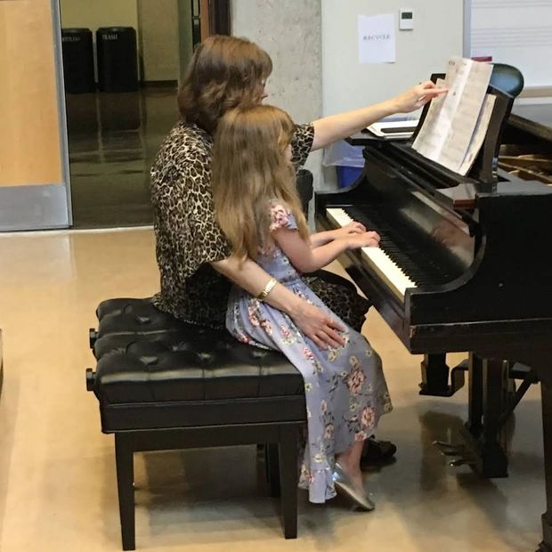 Miss Garin helping a student perform at a recital.
Piano Lessons
Voice Lessons
Kenosha, Racine, Zion