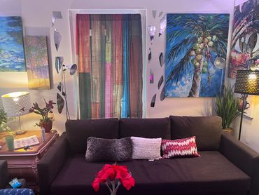 Living room designed to make residents feel at home with stylish picture and ambient lighting