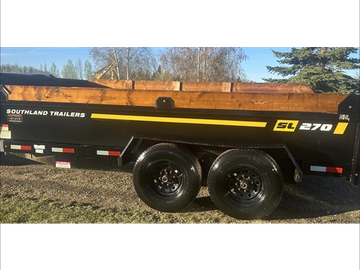 Black Southland Trailers GL270 dump trailer with dual wheels.