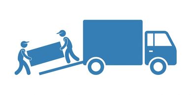 Affordable Man and Van team loading boxes and furniture for a home move in Manchester