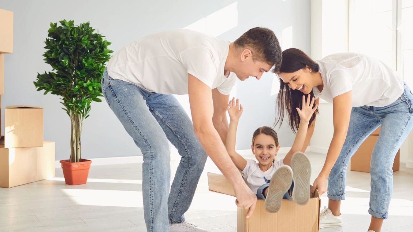 Happy customer with unpacked boxes in Lancashire