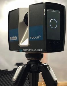 FARO FocusS 3D laser scanner mounted on a tripod for surveying.