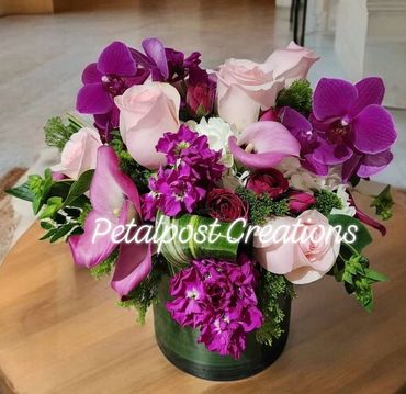 Pink Rose and Purple Orchid flower arrangement