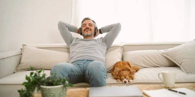 A man relaxing stress free after he killed all of his bed bugs using a heat treatment kit
