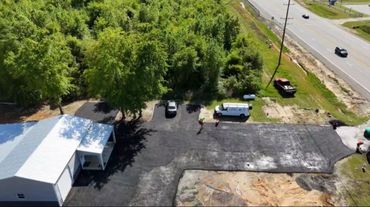 FS Roofing LLC also offers professional asphalt paving services in Dublin, GA for both residential and commercial properties. Whether you need a new driveway, parking lot paving, or asphalt repairs, our team delivers smooth, durable surfaces built to last.
We use high-quality asphalt materials and proper grading techniques to ensure your pavement not only looks great but also stands up to Georgia’s weather. From small patch repairs to large-scale paving projects, we’ve got you covered.