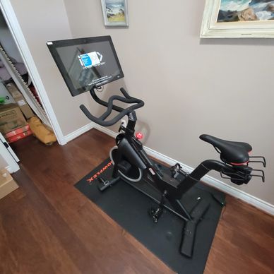 an exercise bike with an iPad Holder 