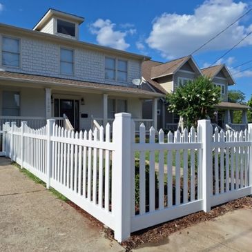 White Vinyl Picket Fence.