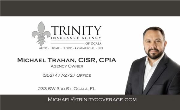 Business card for Michael Trahan, insurance agency owner.