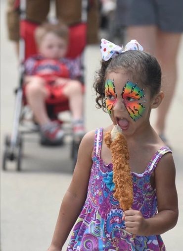 Cornbread Festival  food, little girl