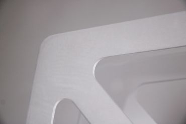 Bent acrylic paper holder, heat-shaped and laser cut with foggy sanded finish – 2025.