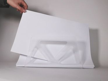 Bent acrylic paper holder, heat-shaped and laser cut with foggy sanded finish – 2025.
