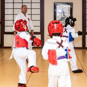 young students sparring