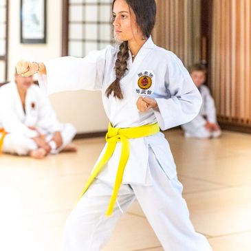 young woman performing a kata