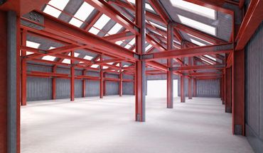 Interior of red iron steel building with skylights