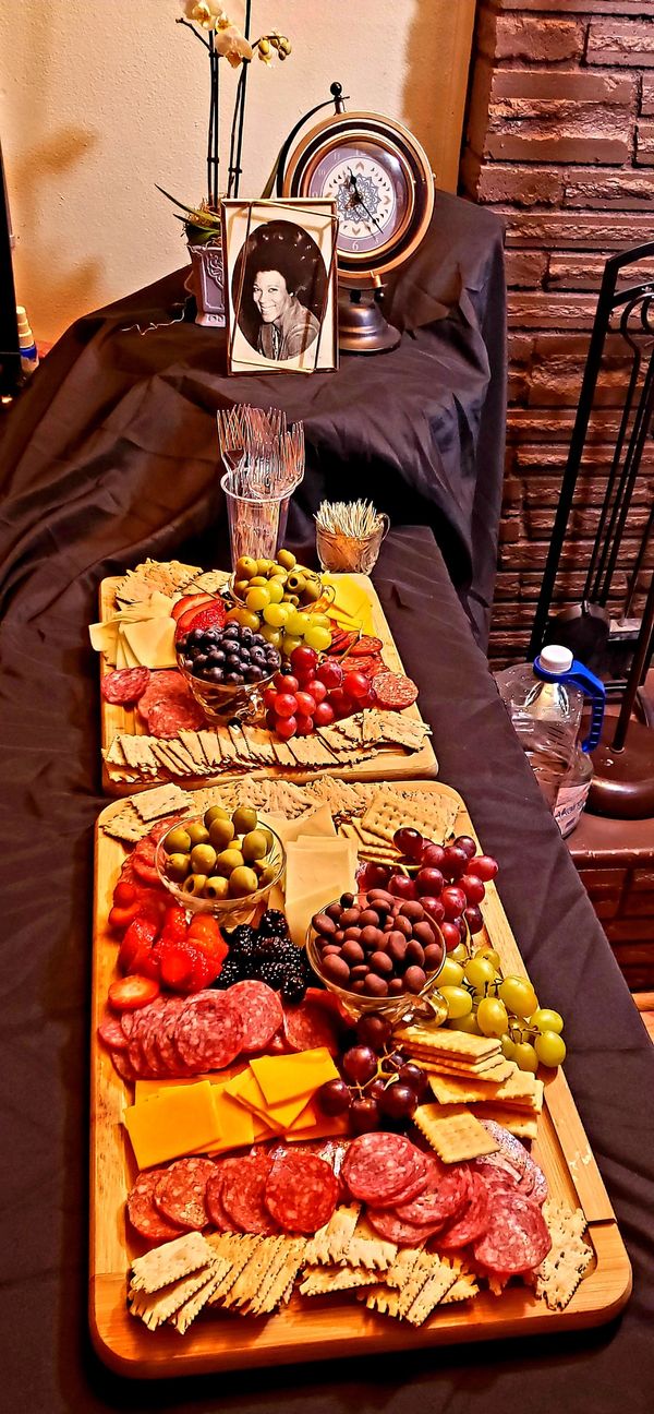 Charcuterie buffet table designed by Gerri Holloway for Greatest Matriarchs Society.