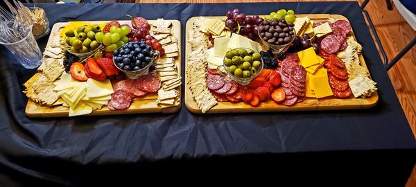 Charcuterie boards designed by Gerri A. Holloway for Greatest Matriarchs Society.
