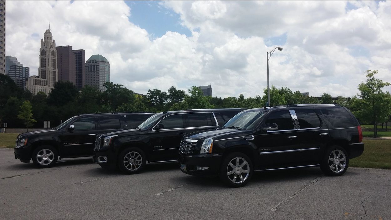 To show variety of quality executive vehicles in a real local setting denoting a real picture.