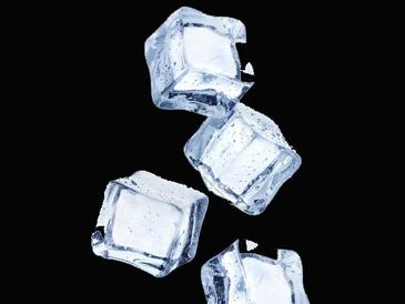 Ice cubes dropping down.