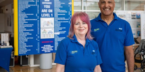 Image of two volunteers