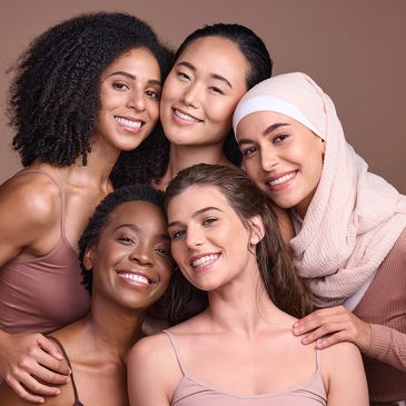 5 woman smiling as a group