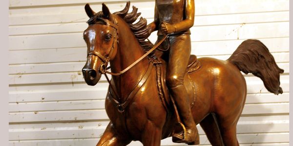 Custom bronze sculpture of an Arabian Horse, Rider and Dog.