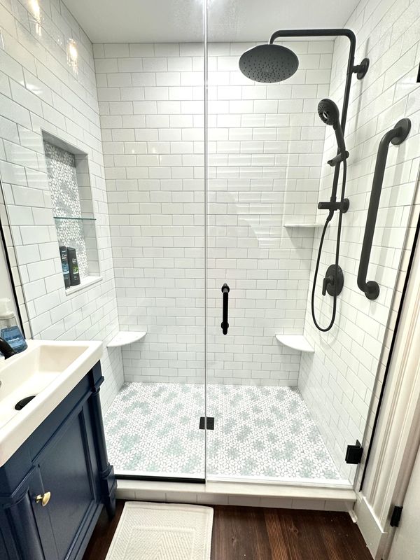 Bathroom renovation
installed new vanity, mirror
New light fixtures
Walk-in shower with tile