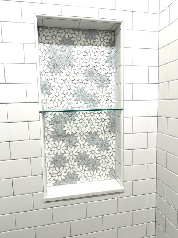 Detailed tile work in new walk-in shower stall.
Bathroom Renovation