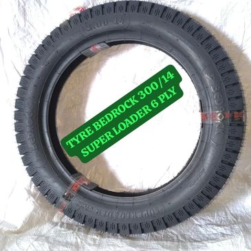 Black Bedrock tyre 300/14 Super Loader 6 ply on white background.